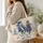 Blue Western Cowgirl Horseback Scene for Rodeo Days and Ranch Life Quilted Tote Bag - 3