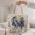 Blue Western Cowgirl Horseback Scene for Rodeo Days and Ranch Life Quilted Tote Bag - 5