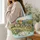 Storybook Cottage Village and Wildflower Meadow for Cozy Country Living and Gifting Quilted Tote Bag - 3