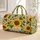 Golden Sunflowers and Green Leaves for Cheerful Camping, Beach Days, and Summer Travel Quilted Weekend Bag - 1