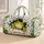 Cheerful Green Frog Breaking Through Cracks for Summer Travel and Adventure Lovers Quilted Weekend Bag - 1