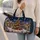 Snowy Christmas Village and Grand Tree for Cozy Winter Getaways and Holiday Travel Quilted Weekend Bag - 2