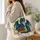 Blue Dragon With Antique Books and Daisies for Fantasy Reading and Cottagecore Gifts Quilted Tote Bag - 3