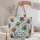 Santa Hat Highland Cow Holiday Cheer for Christmas Celebrations and Cow Lovers Quilted Tote Bag - 5