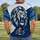 Roaring Lion Mascot and Football Details for Game Day and Casual Fan Wear All-over Print Unisex T-shirt - 4