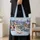 Snowy Christmas Village and Snowman for Cozy Winter Holiday Cheer and Seasonal Gifting Quilted Tote Bag - 4