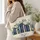 Blue Floral Bookshelf With Daisies For Readers And Cozy Library Days Quilted Tote Bag - 3