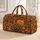 Leopard Spots and Sunset Hues for Beach Days and Bohemian Getaways Quilted Weekend Bag - 1