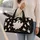 Ivory Halloween Ghosts and Stars for Spooky Seasonal Getaways and Fall Adventures Quilted Weekend Bag - 2