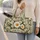 Ivory Daisy And Green Foliage For Relaxed Coastal Getaways And Weekend Travel Quilted Weekend Bag - 2
