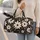 Bold Black and Cream Daisy Blooms for Picnics, Beach Days and Weekend Getaways Quilted Weekend Bag - 2