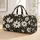 Bold Black and Cream Daisy Blooms for Picnics, Beach Days and Weekend Getaways Quilted Weekend Bag - 1