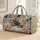 Blue And Rust Wildflowers for Weekend Getaways and Camping Trips for Women and Men Quilted Weekend Bag - 1