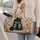 Black Cat and Songbirds for Cozy Weekend Getaways and Nature-Loving Travelers Quilted Weekend Bag - 2