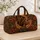 African Woman Profile in Earth-Tone Heritage Patchwork for Culture-Loving Travel Days Quilted Weekend Bag - 4