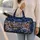 Snowy Village Sleigh Under Golden Stars for Cozy Winter Holiday Travel and Seasonal Escapes Quilted Weekend Bag - 2