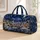 Snowy Village Sleigh Under Golden Stars for Cozy Winter Holiday Travel and Seasonal Escapes Quilted Weekend Bag - 1