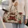 Vintage Christmas Red Boots and Wrapped Gifts for Cozy Holiday Getaways for Women Quilted Weekend Bag - 2