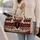 Black Spider And Racing Checks For Bold Road Trips And Alternative Style Enthusiasts Quilted Weekend Bag - 2