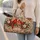 Northern Cardinal Pair With Holly for Cozy Autumn Getaways and Nature-Loving Travelers Quilted Weekend Bag - 2