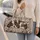 Patchwork Dog and Wildflower Motifs for Cozy Weekend Getaways and Everyday Travel Quilted Weekend Bag - 2