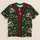 Christmas Holiday Green Vest with Santa and Candy Trains for Festive Parties and Gifting All-over Print Unisex T-shirt - 1
