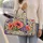 Coral Poppies and Violet Irises for Coastal Getaways and Weekend Escapes Quilted Weekend Bag - 2
