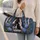 Black And White Horse With Blue Hydrangeas For Cottage Garden Getaways And Travel Quilted Weekend Bag - 2