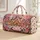 Pink Gingerbread Village and Snowy Trees for Cozy Christmas Getaways Quilted Weekend Bag - 1
