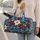 Winter Blue Poinsettia And Candy Cane Motifs For Holiday Travel And Cozy Getaways Quilted Weekend Bag - 2