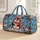 Penguin Holding a Gift in Winter Snow for Cozy Holiday Travel and Seasonal Getaways Quilted Weekend Bag - 1