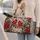 Winter Cardinals, Holly and Pinecones for Cozy Cabin Seasonal Holiday Travel Getaways Quilted Weekend Bag - 2