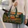 Retro Camper in Sunset Pine Forest with Wildflowers for Scenic Weekend Getaways Quilted Weekend Bag - 2