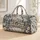 Blue Butterfly Conservatory Blooms for Winter Getaways and Garden-Loving Travelers Quilted Weekend Bag - 1