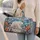 Polar Bear Amid Coral Arctic Wildflowers for Peaceful Winter Getaways and Nature Lovers Quilted Weekend Bag - 2