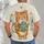 Orange Cat Holding Teapot With Stars for Cozy Everyday Wear and Cat Lovers All-over Print Unisex T-shirt - 4