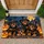 Four Rottweiler Puppies in Wizard Hats for a Whimsical Halloween Night Doormat - 1