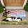 Black And White Cat Beneath Cherry Blossoms For Peaceful Spring Home Decor Lovers Doormat - 1