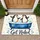 Playful Penguin Pair in Blue Bathtub for Quirky Bathroom Decor and Nature Lovers Doormat - 1