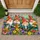 Four Garden Gnomes Among Colorful Flowers for Whimsical Cottage Entryway Cheer Doormat - 1