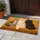Three Curious Cats on an Ochre Sofa for Cozy Farmhouse Homes and Cat Lovers Everywhere Doormat - 4