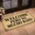 Spanish Welcome Saying with Ornate Black Flourishes for a Playful Entryway Home Doormat - 2