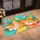 Sleeping Ginger Tabby Kitten Among Tulips and Wildflowers for Cozy Cat-Lover Homes Doormat - 2