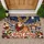 Festive Reindeer In A Snowy Christmas Village For Cozy Winter Holiday Entryways And Homes Doormat - 1