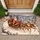 Santa Claus Sleigh and Two Reindeer in a Snowy Village for Cozy Christmas Homes Doormat - 1