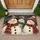 Three Rustic Christmas Snowmen in a Vintage Winter Scene for Cozy Holiday Home Decor Doormat - 1