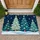 Four Folk Art Christmas Trees with Hearts and Snowflakes for Cozy Holiday Entryways Doormat - 1