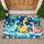 Three Dinosaur Ocean Adventure with Rainbows and Sailboats for Cheerful Coastal Homes Doormat - 1
