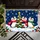 Three Scarf-Wearing Penguins Around a Snowy Tree for Cozy Christmas Holiday Cheer Indoors Doormat - 5