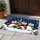 Three Scarf-Wearing Penguins Around a Snowy Tree for Cozy Christmas Holiday Cheer Indoors Doormat - 4